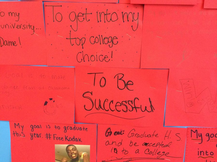 Lemont High School students write a brief response about what they want to accomplish; it may seem unattainable at the moment, but will soon become achievable.