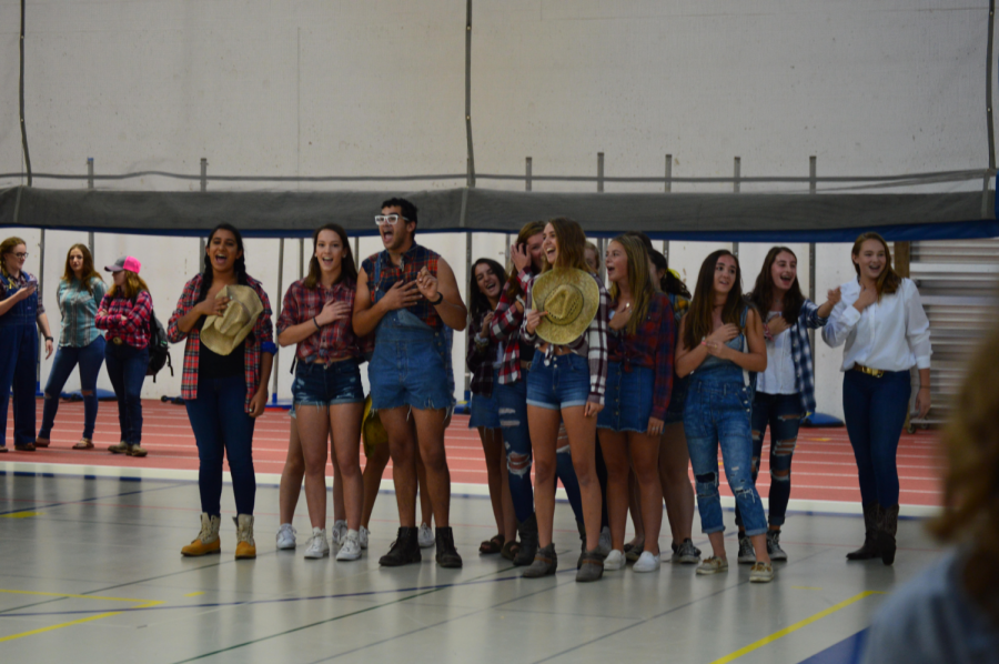 Juniors sang the pledge of allegiance for a skit.