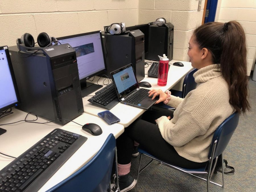  Journalism student Gloria Vargas finishes up an article on her school-issued Chromebook. Personal devices like these are changing the way students interact with technology and learning.