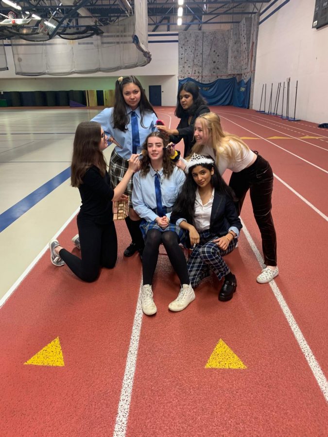 Juniors Nour Longi, 
Chloe Kwasigroch, Kelsi Padalia, 
Brooke Kraft, Mary Arundel, and Mackenzie Michaelson 
striking a pose after performing their “The Princess Diaries” skit, which took the days first place prize. Kwasigroch said, Winning first place was such a great feeling. We really
put a lot of time and effort into planning the skit, and it paid off in the end!
