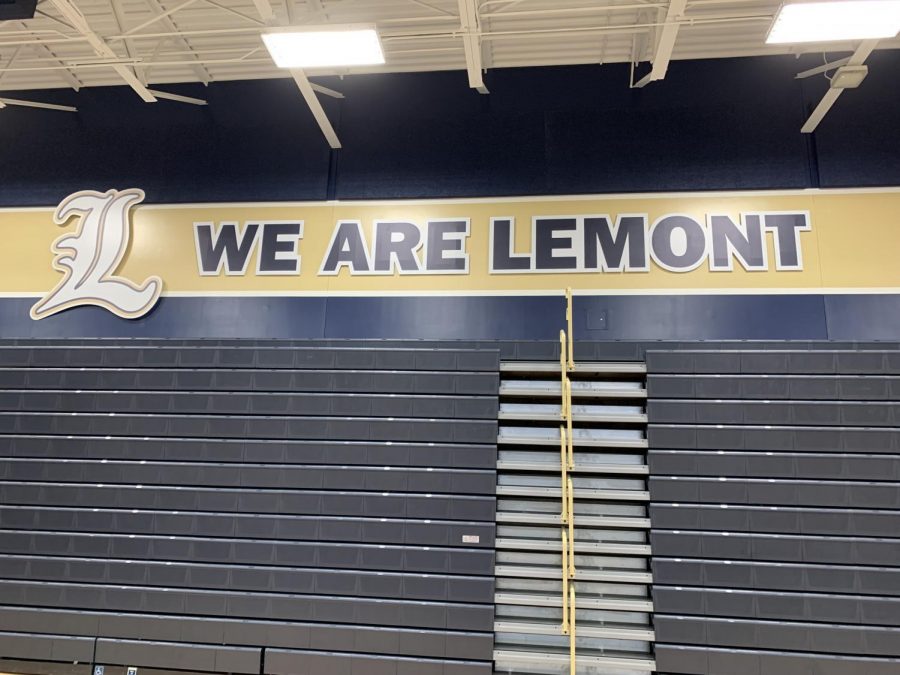 The+newly+renovated+gym+exhibits+We+Are+Lemont+in+an+effort+to+reduce+costs+when+the+name+and+mascot+changed.+