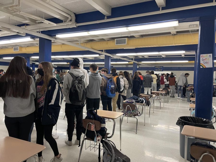Students line up for lunch in the “Grill & Bake,” line. Many of the lines are very long and almost reach to the back of the cafeteria. 