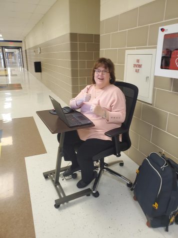 Mrs. Melei focuses on grading her last batch of essays of her teaching career.