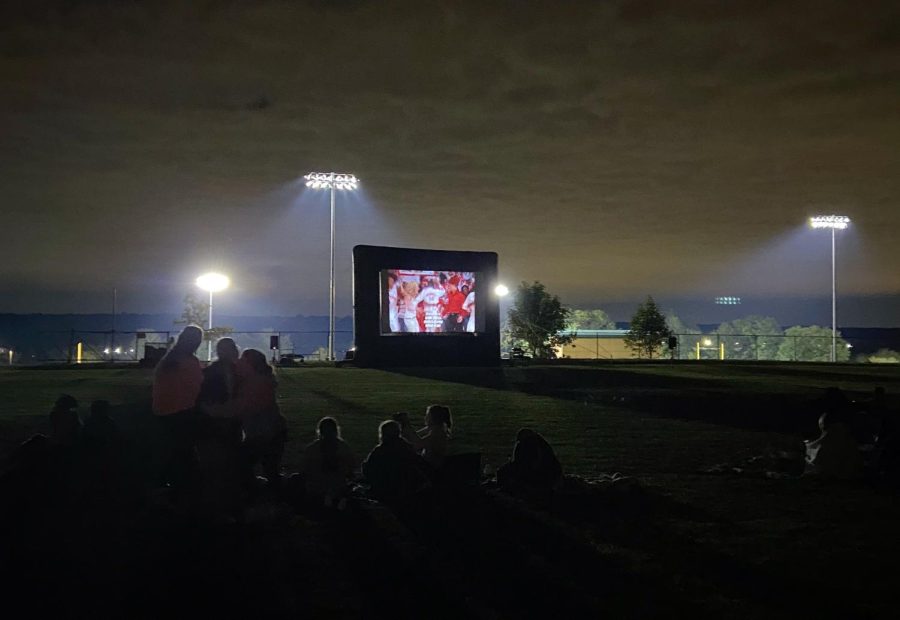 Students gather on the lower baseball field to watch “High School Musical” and raise money for Parker Power. 
