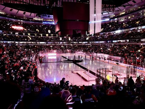 Chicago Blackhawks decorate the ice in honor of Marian Hossa. Fans were given bracelets that light up to create a light show while Hossa’s banner is sent to the rafters of the United Center.
