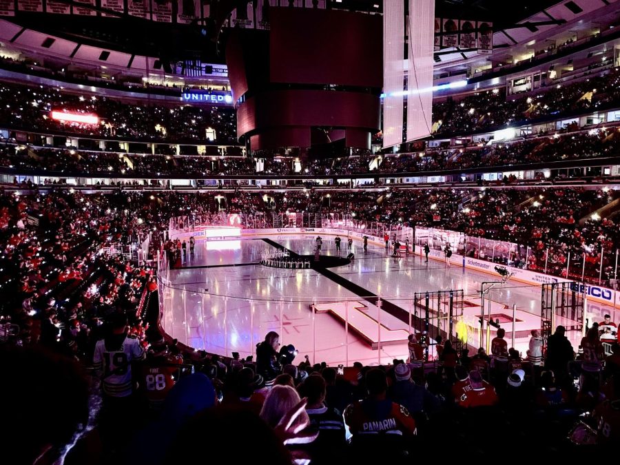 Chicago+Blackhawks+decorate+the+ice+in+honor+of+Marian+Hossa.+Fans+were+given+bracelets+that+light+up+to+create+a+light+show+while+Hossa%E2%80%99s+banner+is+sent+to+the+rafters+of+the+United+Center.%0A