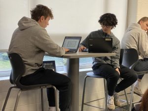 Students work in the newly-renovated journalism classroom, which has set the standard for future classroom renovations.