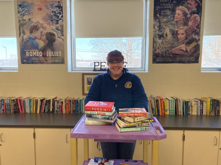 Mrs. Parry with only a few books from her personal library that is always open for students, even if you are not taking modern fiction. “I want students to have fun in an English class again! Good story-telling is all around us in movies, comics, novels, short stories, poetry, commercials, song lyrics, etc,” Parry said.