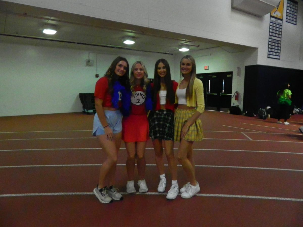 Students show off their creative duos dressing as characters such as Thing One and Thing Two and Cher and Dionne from ‘Clueless.’ From left to right, juniors Ava Zdenovec, Ashley Scruggs, Eleni Tsahiridis and Fiona Tkach.
