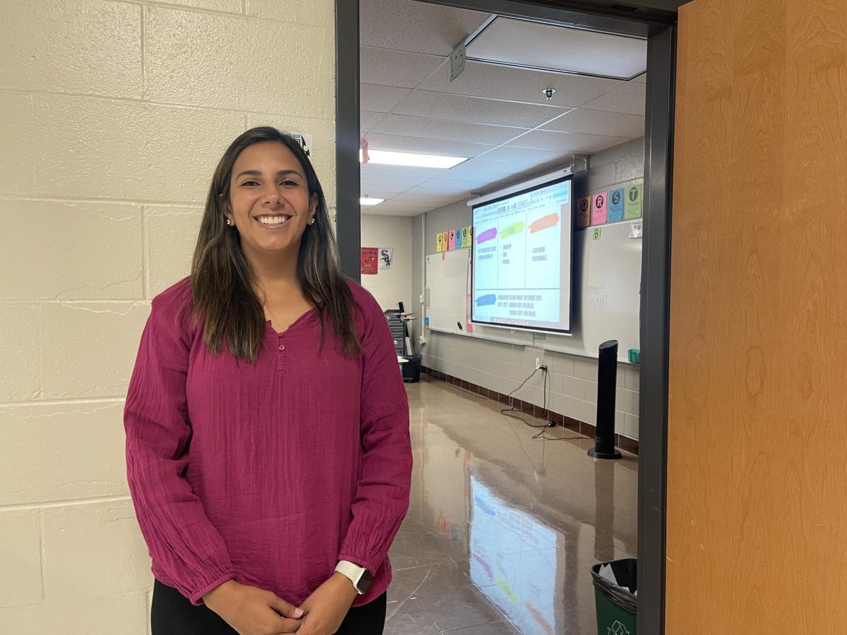 Ashley Urbaniak stands outside her new classroom where she is ready and excited to start teaching.