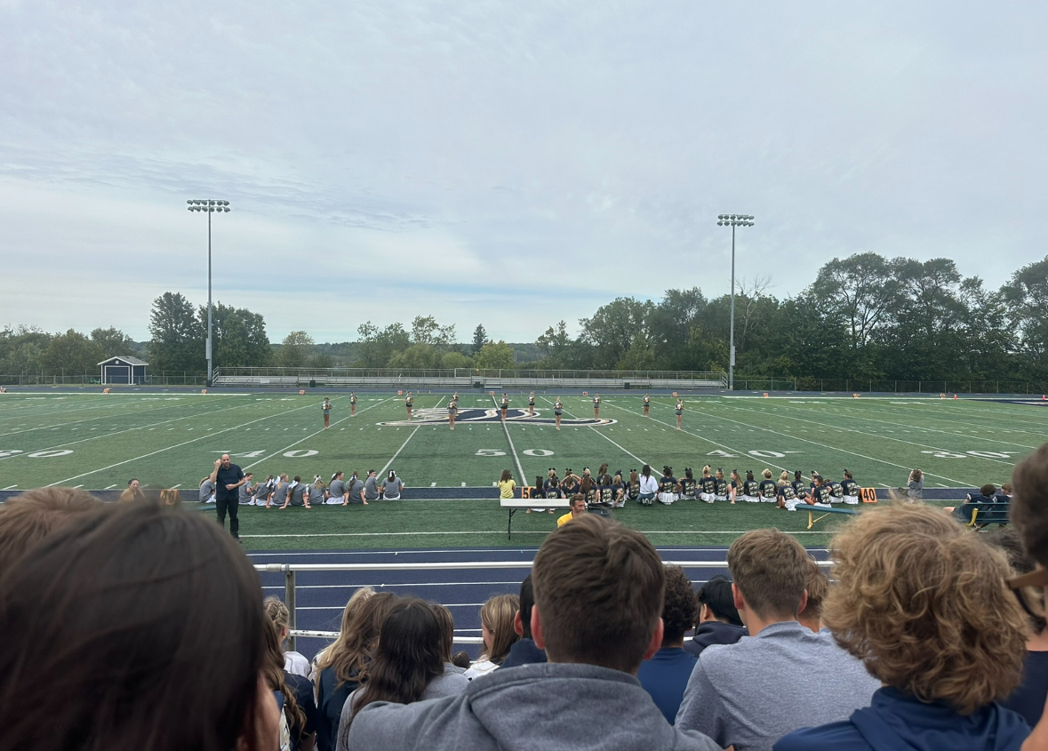 Lemont students watch as the junior varsity dance team begins their performance.