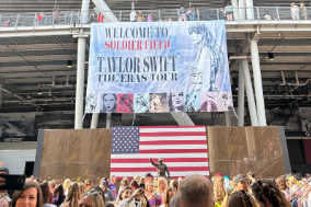 Fans enter Soldier Field in Chicago to watch Swift’s performance in 2023. 