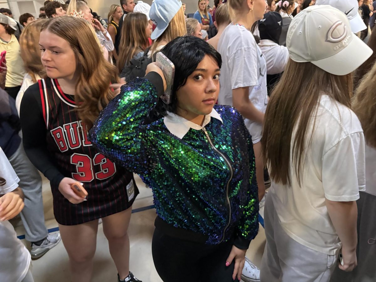 Sophomore Angelina Calderon dresses as Kris Jenner during Celebrity Day.