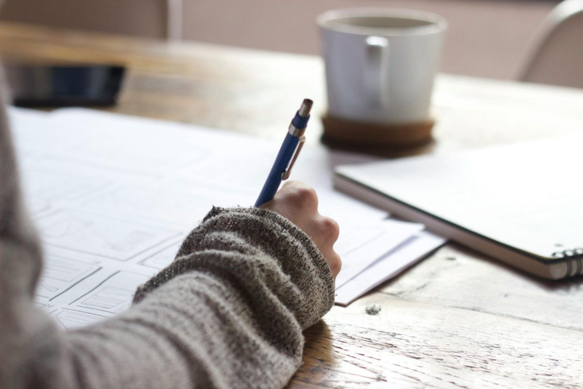 Student studies with a mug of coffee. Photo provided by Unsplash.
