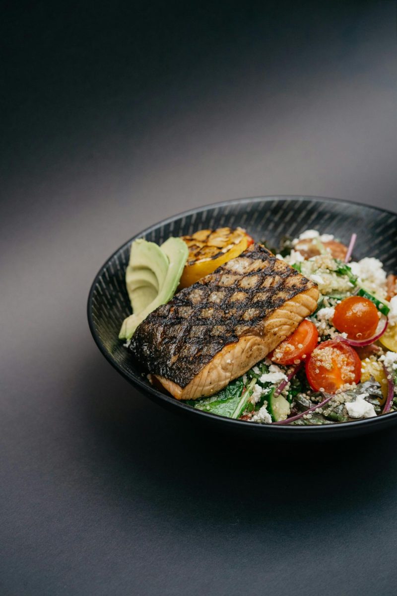 Healthy salmon salad bowl packed with nutrient-dense foods.